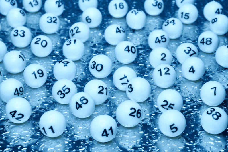 Small white balls with numbers printed on them.